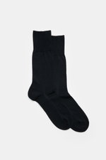 Pair of Falke Sock 'No. 6' dark navy photographed from above on a white background, showcasing fine knit, reinforced heel and toe, elastic fabric, wide bands, and slight silky shine. 

With the 'No. 6' sock, FALKE shows how luxurious comfort can be: The f