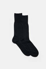 Pair of Falke Sock 'No. 6' dark navy photographed from above on a white background, showcasing fine knit, reinforced heel and toe, elastic fabric, wide bands, and slight silky shine. 

With the 'No. 6' sock, FALKE shows how luxurious comfort can be: The f