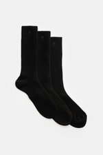 A front perspective view of Ami Paris Strümpfe 3er-Set schwarz, three black ribbed socks with reinforced zones, wide cuffs, and heart stitching. Vom Basic zum Statement mit Herzensangelegenheit schaffen es die Strümpfe im 3er-Set von AMI PARIS, die das fr