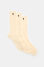 Ami Paris Socks pack of 3 pairs cream shown from a top-down perspective, featuring rib knit texture and signature heart stitching.