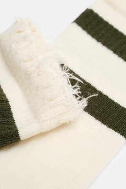 Close-up top view of Golden Goose Socks Cream/Dark Olive Striped showing rib knit texture and frayed edge detail, sporty and vintage.

<p>Sporty basic: The GOLDEN GOOSE socks impress with unparalleled comfort and a casual vintage look. </p>
<ul>
<li>mix o