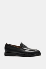 Side view of Officine Creative Penny Loafer 'Opera Flexi' black in polished smooth leather with a narrow tapered silhouette and penny strap.

Description: 
<p>The Italian shoe brand OFFICINE CREATIVE complements the Penny Loafer 'Opera Flexi' with polishe