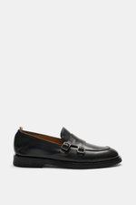 Officine Creative Double Monk 'Opera Flexi' black shoe shown from side profile, noble smooth leather, double monk strap, slightly tapered silhouette, decorative stitch on toe cap, grosgrain pull tab, leather lining, natural rubber outsole, stylish and com