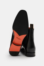 Santoni Chelsea Boot 'Adrian' black shown from sole and back view, polished smooth leather, narrow tapered silhouette, side elastic inserts, pull tab, leather lining, leather sole with rubber insert.