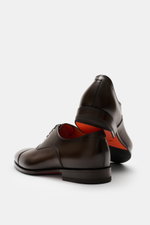 Rear and side view of Santoni Oxford shoes dark brown in premium smooth leather with cap toe and tapered silhouette, showcasing leather outsole and rubber-reinforced heel.

Description:  
<p>Classic, elegant, timeless: These elegant, Italian-made Oxford s