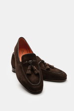 Santoni Suede Tassel Loafer 'Carter' brown shown from front-side angle, soft suede leather, narrow tapering silhouette, front cap with decorative seam, typical tassel, leather lining, flexible rubber sole, rubber reinforcement on heel.