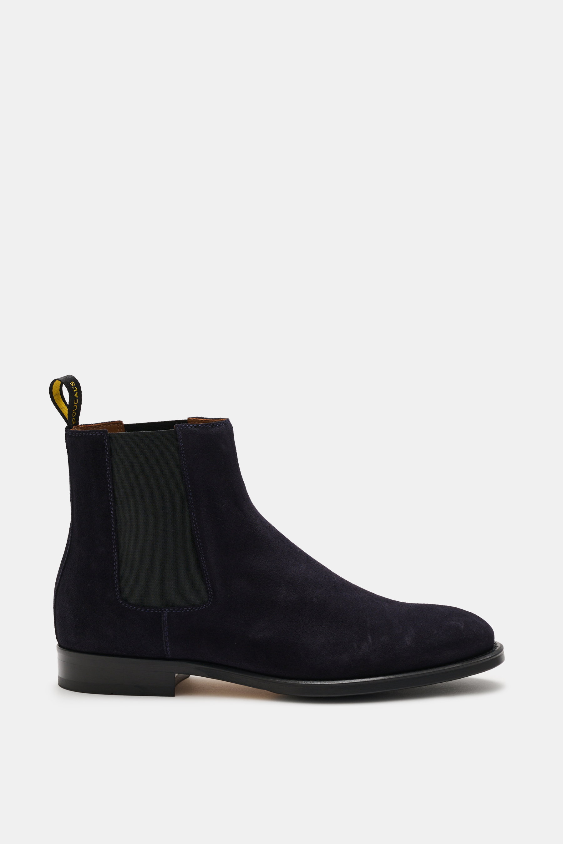 Side view of Doucal's Chelsea Boot 'Orvieto Flex' navy in fine suede leather, narrow tapered silhouette with elastic inserts, leather lining, and leather sole with rubber sections.