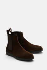 Side-front view of Fabi Chelsea boots 'Boston' dark brown in supple suede leather with elastic inserts, pull tab, leather lining, and rubber sole.