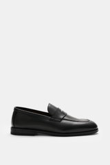 Henderson Penny Loafer 'Royal' black shown from side view, made of finely grained leather with typical penny strap, narrow tapering silhouette, decorative stitching on toe cap, Goodyear-welted, leather lining, rubber outsole, and heel with rubber reinforc