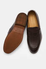 Top view of Henderson Penny Loafer 'Cervo' dark brown with finely grained leather, penny strap, tapered silhouette, and stitched cap.