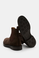 Henderson Chelsea Boot dark brown shown from rear and sole view, featuring noble velour leather, Blake construction, slightly tapered silhouette, elastic inserts, leather lining, practical pull tab, and profiled rubber outsole.