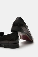 Rear and side view of Sturlini Penny loafers 'Bufalo' dark brown in fine smooth leather with tapered silhouette and distinctive topstitching. 

Description:  
<p>The 'Bufalo' penny loafers by STURLINI bring preppy style into modern balance with a touch of