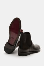 Sturlini Chelsea boot 'Bufalo' dark brown shown from side and sole view, made of noble smooth leather with elastic inserts.

Description:  
<p>The stitched Chelsea Boot 'Bufalo' is a classic from the Italian manufacturer STURLINI. Made from fine leather w