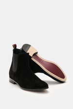 Front and sole view of Sturlini Chelsea Boot 'Crosta Piuma' black in fine suede leather with elastic inserts, leather lining, welted sole, and grosgrain pull tab.