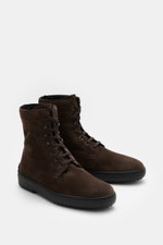 Tod's Lace-up boots brown in soft suede with lambskin lining, seven-eyelet lacing with hooks, tapered cut, and nubbed rubber sole, front-side view.