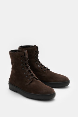 Tod's Lace-up boots brown in soft suede with lambskin lining, seven-eyelet lacing with hooks, tapered cut, and nubbed rubber sole, front-side view.