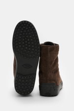 Tod's Lace-up boots brown shown from the sole and rear perspective, featuring soft suede, slightly tapered cut, seven-eyelet lacing with hooks and eyelets, lambskin lining, and signature nubbed rubber sole.
