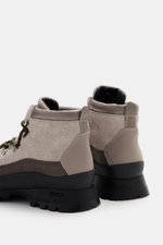 Collegium Lace-up boot grey/taupe/black shown from rear side, featuring durable suede leather, round shape, smooth leather overlays, seven-hole lacing with hooks and eyelets, tongue with shoelace loops, leather lining, practical pull loop, and durable rub