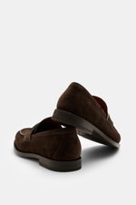 Rear side view of Zegna Penny Loafer dark brown in noble suede leather with Blake construction, narrow tapering silhouette, penny strap, decorative toe stitch, leather lining, and rubber outsole.