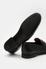 Bottom and side view of Church's Penny Loafer 'Milton' black showcasing supple leather, Goodyear-welted sole, and narrow tapered silhouette.

<p>The Penny Loafer 'Milton' by CHURCH'S impresses with its supple leather and classic silhouette – perfect for s