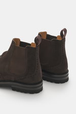 Rear close-up view of Church's Chelsea Boot 'MC Entyre LW' grey-brown in fine suede leather with broguing, elastic inserts, leather lining, pull loop, and profiled rubber sole.