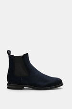 Side view of Fabiano Ricci Chelsea Boot navy in noble suede leather with elastic inserts, tapered silhouette, leather lining, pull tab, and flexible rubber sole.
