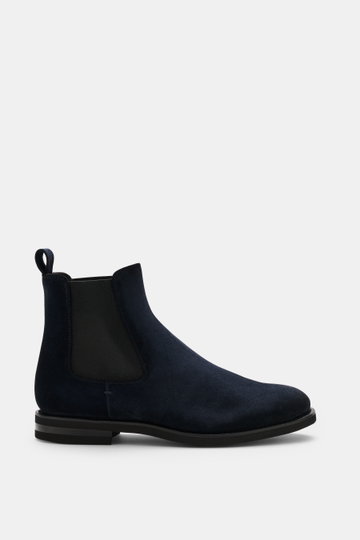 Side view of Fabiano Ricci Chelsea Boot navy in noble suede leather with elastic inserts, tapered silhouette, leather lining, pull tab, and flexible rubber sole.