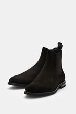 Fabiano Ricci Chelsea Boot dark brown shown from front side angle, made of noble suede leather with elastic inserts, leather lining, and flexible rubber sole, perfect for transitional season. This sporty Chelsea boot features a slightly tapered silhouette