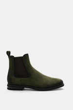Fabiano Ricci Chelsea Boot dark green shown from the side, crafted from noble suede leather with elastic inserts, leather lining, pull tab, and flexible rubber sole. This sporty Chelsea boot made of noble suede leather by FABIANO RICCI is perfect for the 