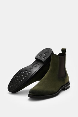 Fabiano Ricci Chelsea Boot dark green shown from a low side and sole perspective, featuring noble suede leather, slightly tapered silhouette, elastic inserts, leather lining, practical pull tab, and flexible studded rubber sole for comfort.

Description: 