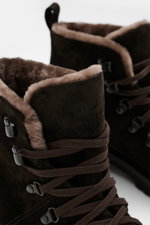 Close-up perspective of the Fabiano Ricci Lace-up boot dark brown showcasing noble suede leather, rounded toe cap, seven-eyelet lacing with hooks, leather lining, and flexible rubber sole. Essential for colder days, this suede lace-up boot from FABIANO RI