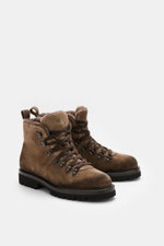 Front angled view of Fabiano Ricci Lace-up boot taupe made of noble suede leather with rounded toe, seven-eyelet lacing, leather lining, and flexible rubber sole, essential for colder days.

Description: 
<p>Essential for colder days: The suede lace-up bo