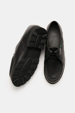 Paraboot Lace-up shoes 'Michael' black shown from top and sole view, featuring grained smooth leather, Norwegian welt seam, moc-toe, two-eyelet lacing, PARABOOT label, leather lining, and durable natural rubber outsole.