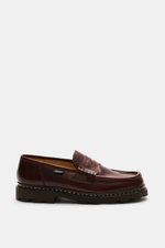 Paraboot Penny loafers 'Reims' brown shown from side view, chunky silhouette with high-quality calf leather, vintage finish.