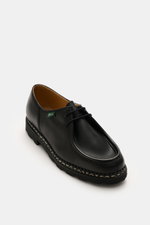 Paraboot Dress shoes 'Michael' black shown from a high front angle, featuring fine nubuck leather, Norwegian welted design, two-eyelet lacing, subtle PARABOOT label, leather lining, and robust natural rubber outsole, a timeless classic designed in 1945 by