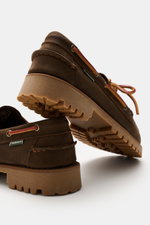 Close-up view from below of Sebago Boat Shoe 'Ranger Muddy' Brown, showing durable nubuck leather, tapered silhouette, leather band lacing, decorative toe stitch, leather lining, and rubber sole with tread.