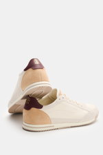 Rear-side view of Brunello Cucinelli Sneaker offwhite/hellgrau featuring retro style, grainy smooth and suede leather, slim silhouette, leather appliqués, seven-hole lacing, label tongue, logo-printed heel collar, smooth leather lining, and ribbed rubber 