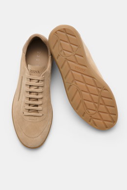 Top view of Zegna Sneakers sand in smooth suede with round toe, seven-eyelet lacing, embossed tongue, leather lining, and flexible rubber sole.