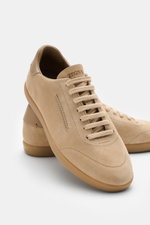 Front angled view of Zegna Sneakers sand in smooth suede with round toe, seven-eyelet lacing, embossed tongue, leather lining, and flexible rubber sole.