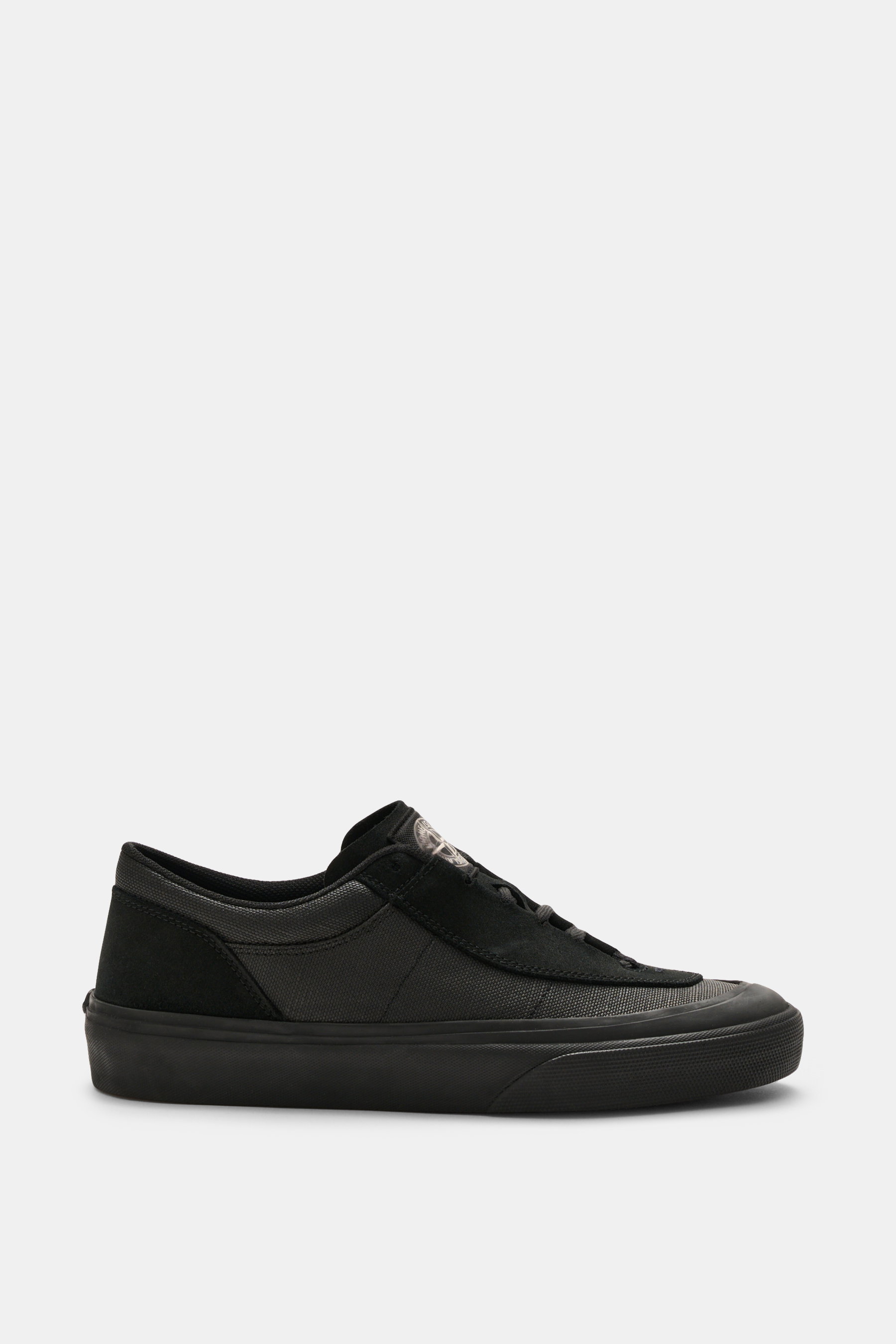 Stone Island Sneakers black shown from side view, made of canvas and suede leather, round toe cap, five-eyelet lacing, logo patch on the tongue, textile lining, all-around rubber coating, durable rubber sole.
