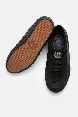 Stone Island Sneakers black shown from above, featuring canvas and suede leather, round toe cap, five-eyelet lacing, logo patch on tongue, textile lining, all-around rubber coating, and durable rubber sole.