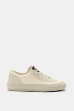 Stone Island Sneaker cream/sand shown from the side, featuring canvas and suede leather, round toe cap, rubber coating, five-hole lacing, logo patch on tongue, textile lining, and durable rubber sole.
