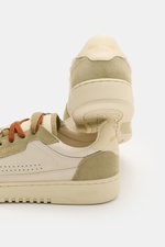 Rear and side view of Axel Arigato Sneaker 'Dice Lo' sand/salbei in retro design with nubuck and velour overlays, perforations, and brown laces.

Description: <p>Retro-Design neu gedacht: Mit dem Sneaker 'Dice Lo' präsentiert AXEL ARIGATO ein von Vintage-