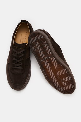 Top-down view of Henderson Sneaker 'Levante' dark brown made of soft suede leather with round toe cap and five-eyelet lacing, showing logo embossing on the tongue, perforated leather lining, and rubber outsole.

<p>The sneaker 'Levante' by HENDERSON made 