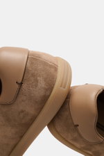 Close-up side and top view of Zegna Sneakers taupe in smooth suede with round toe cap and flexible natural rubber sole.

Description: <p>These timeless sneakers in supple suede by ZEGNA combine a deconstructed silhouette with a successful balance between 