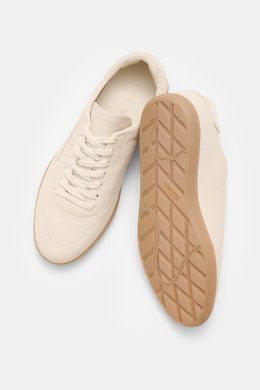 Zegna Sneaker sand shown from above and side, made of grained leather with round toe cap, seven-eyelet lacing, shoe tongue with ZEGNA embossing, leather lining, and flexible rubber sole.