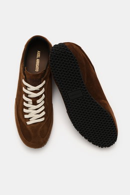 Top view of Axel Arigato Sneaker 'Daze Runner' dark brown in supple suede leather with tonal overlays, rounded toe cap, seven-eyelet lacing, padded collar, terry lining, and flexible black rubber sole. 

<p>Minimalism in motion: The 'Daze Runner' from AXE