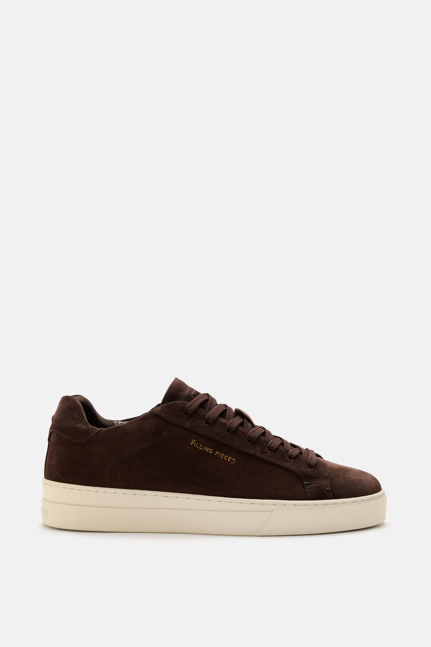 Side view of the Filling Pieces Sneaker 'Tiebreak Suede' dark brown, a sporty all-rounder low-top sneaker with high-quality suede leather, round toe cap, seven-eyelet lacing, side logo embossing, padded collar, leather lining, and flexible rubber sole.