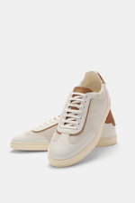 Front-side perspective of Brunello Cucinelli Sneakers sand/brown in suede and leather, featuring seven-eyelet lacing and padded collar.

<p>This retro-style sneaker model by BRUNELLO CUCINELLI made of fine suede and smooth leather promises an especially f