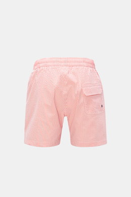 Rear view of 04651/ A trip in a bag Seersucker swim shorts 'Seersucker Swim' orange/white striped with elastic waistband and back pocket.

Description: <p>You'll be perfectly prepared for a dip in the sea or the pool in the 'Seersucker Swim' swim shorts b